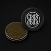 Open round metal tin filled with small dark caviar roe next to a black lid printed with a white monogram logo.