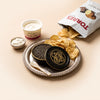 Bring the Tin Kit: PRL caviar tin on a silver tray with crème fraîche, black truffle potato chips and a pearl spoon